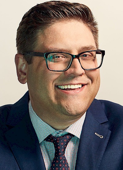 A headshot of Tim Coldwell.