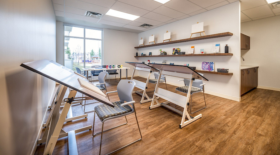 Desks and chairs in an art room.