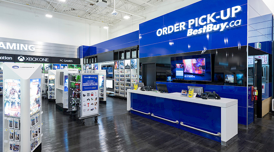 Interior image of a renovated Best Buy, construction completed by Chandos Construction, image showcases an order pick up area
