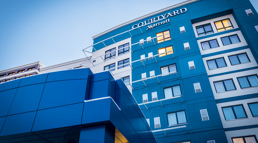 A photo of the black exterior of the Residence Inn and Courtyard by Marriott.