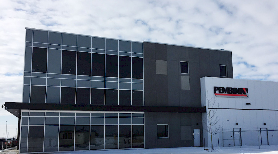 The exterior of the Pembina RFS Office building on a snowy day.