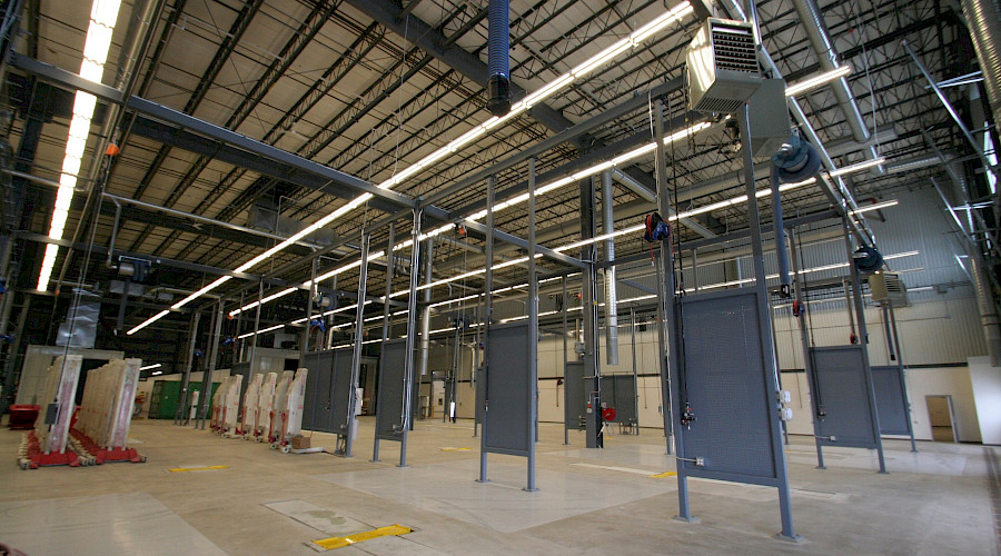 An empty bus and fleet bodywork facility.