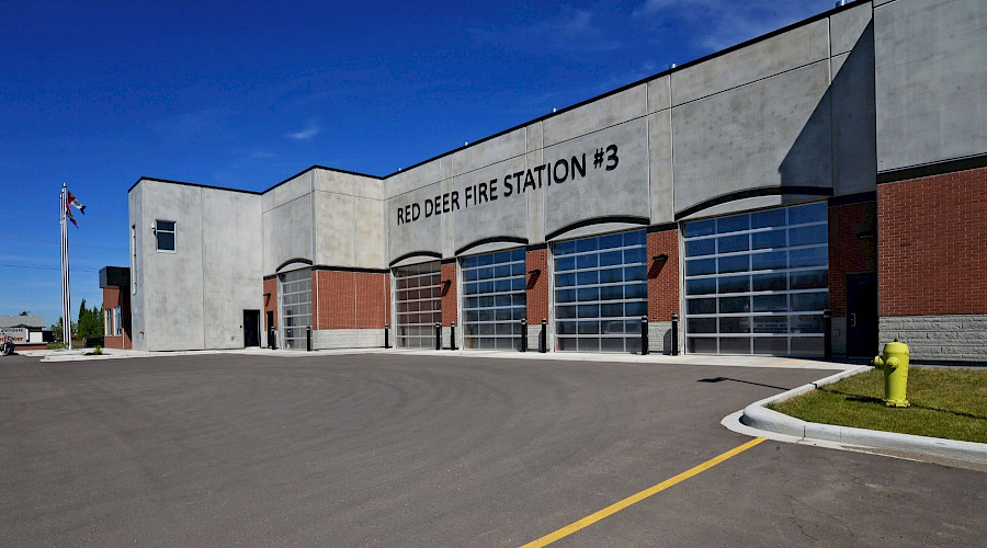 Multiple full-view garage doors in the Red Deer Fire Station.