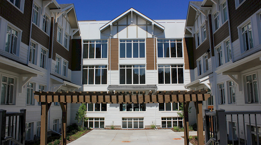 An arbor in a courtyard in the University of Alberta's Tamarach and Pinecrest Residences.