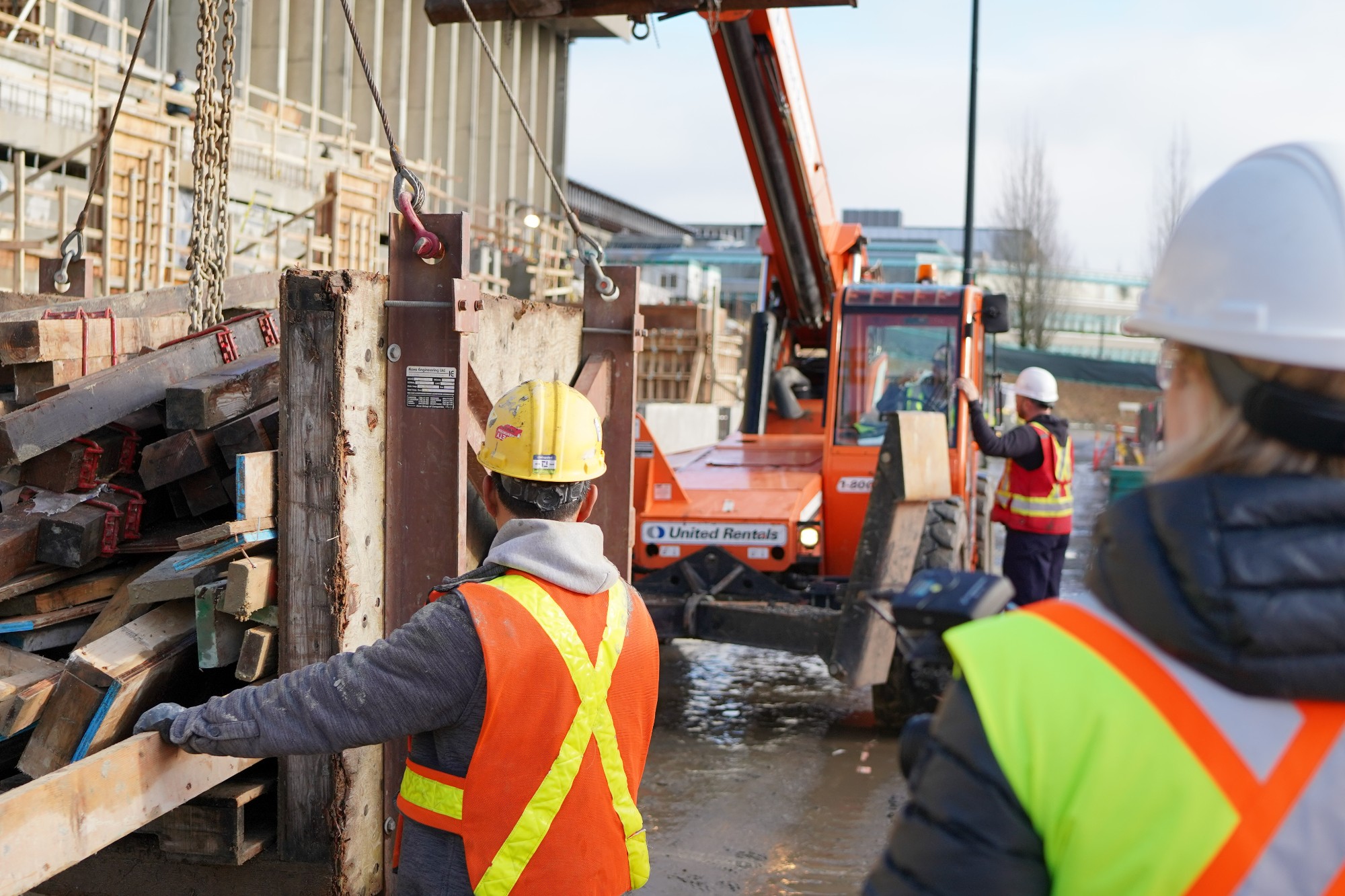 Chandos construction workers collaborating on site.