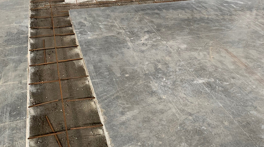 A concrete floor under construction.