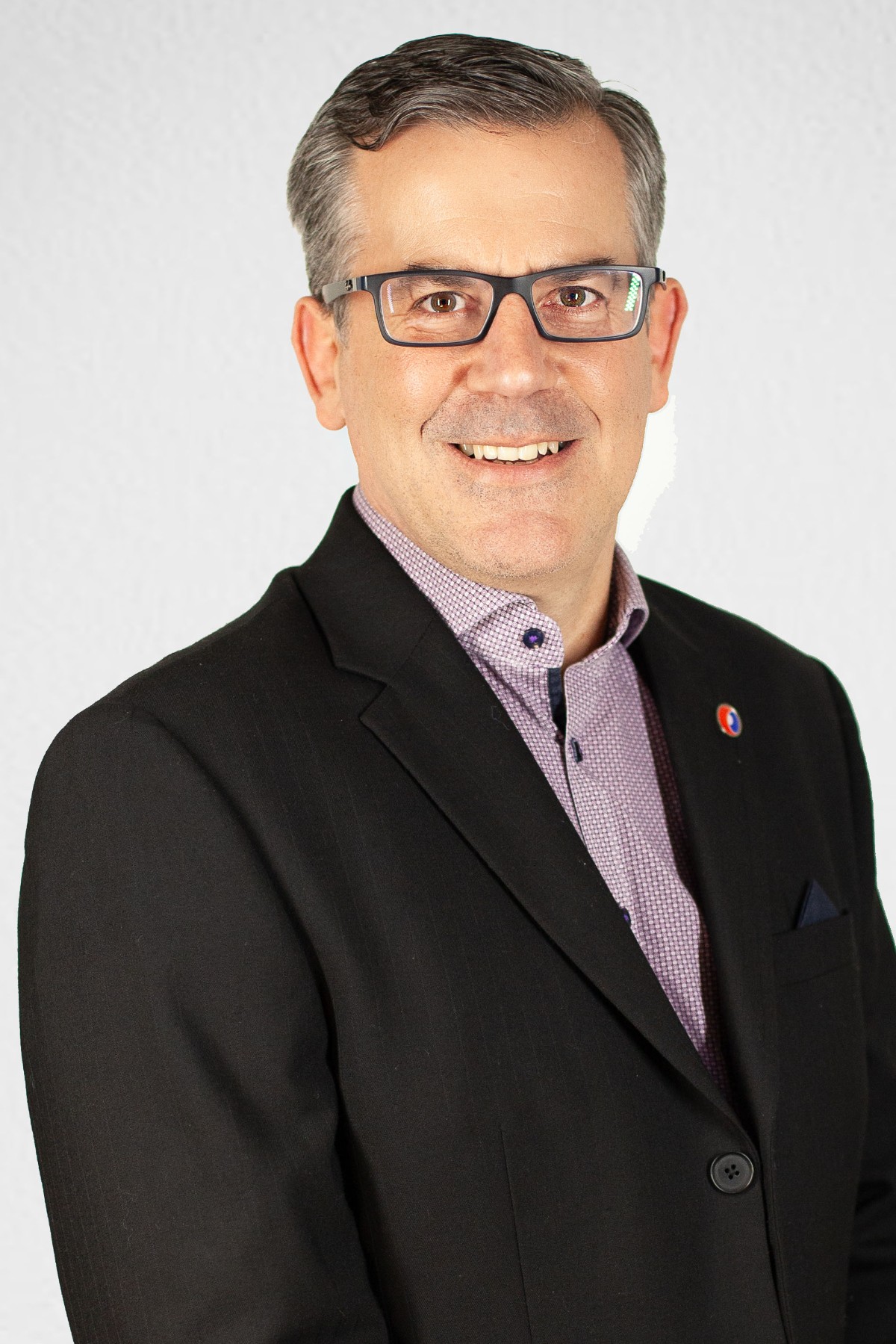 A headshot of Ian Nutley.