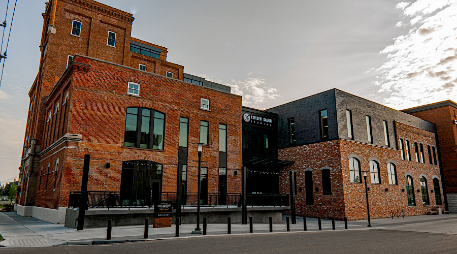 The black and brick exterior of the historic Molson Tower in Edmonton's Brewery District.