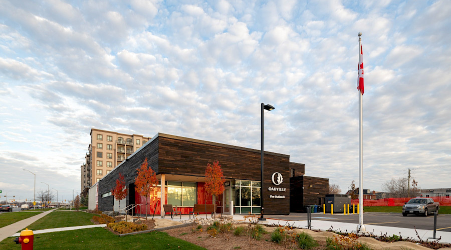 The exterior of the Oakville Fire Station building under a cloudy sky.