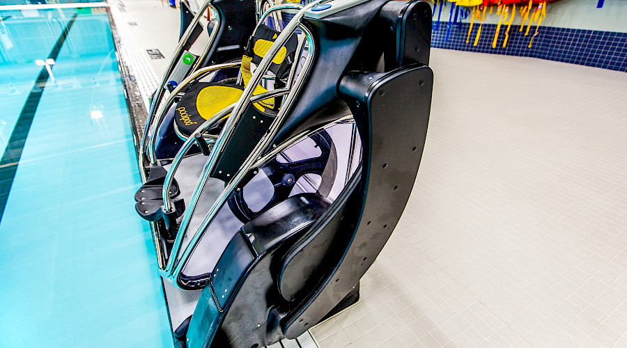 A poolpod water elevator for wheelchair users to enter and exit the pool.