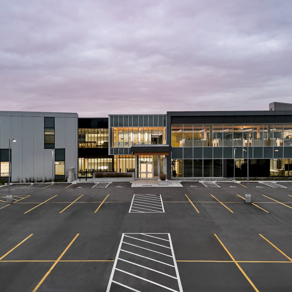 Exterior image of the new Ottawa Operations Centre, built by Chandos Construction. Highlighting the mass timber interior features.