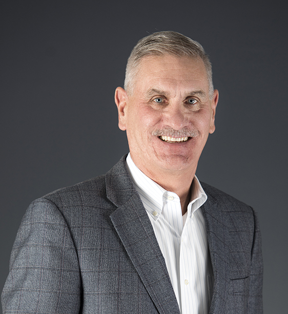 A headshot of Bill Hughes.