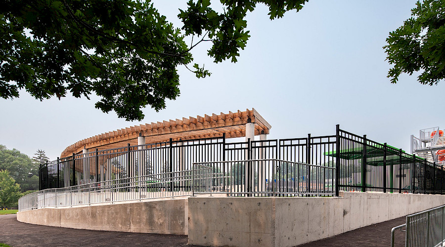 Image of self-performed, barrier free access concrete ramp to the swimming pool deck area of the facility.