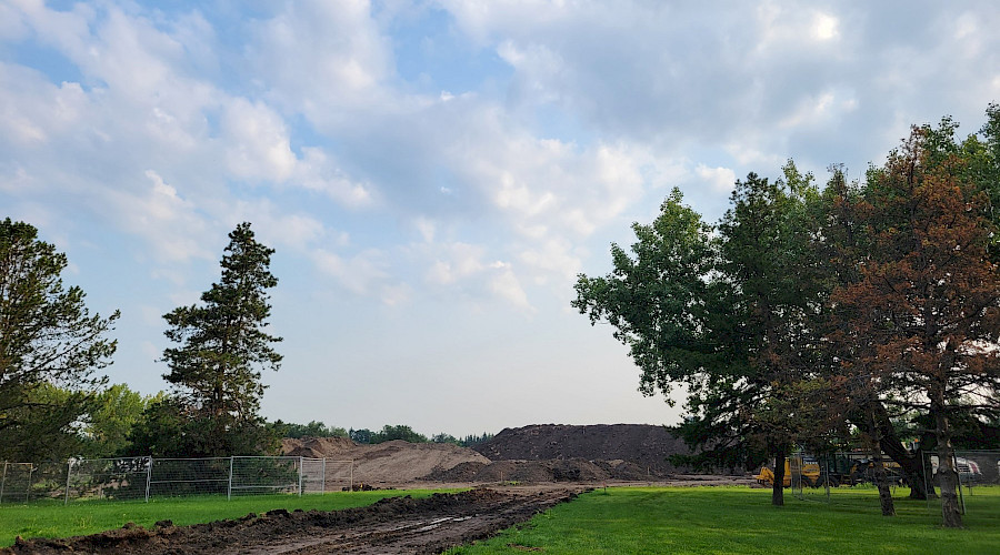 Underground cables and piping being laid at William Hawrelak Park in Edmonton by Chandos Construction