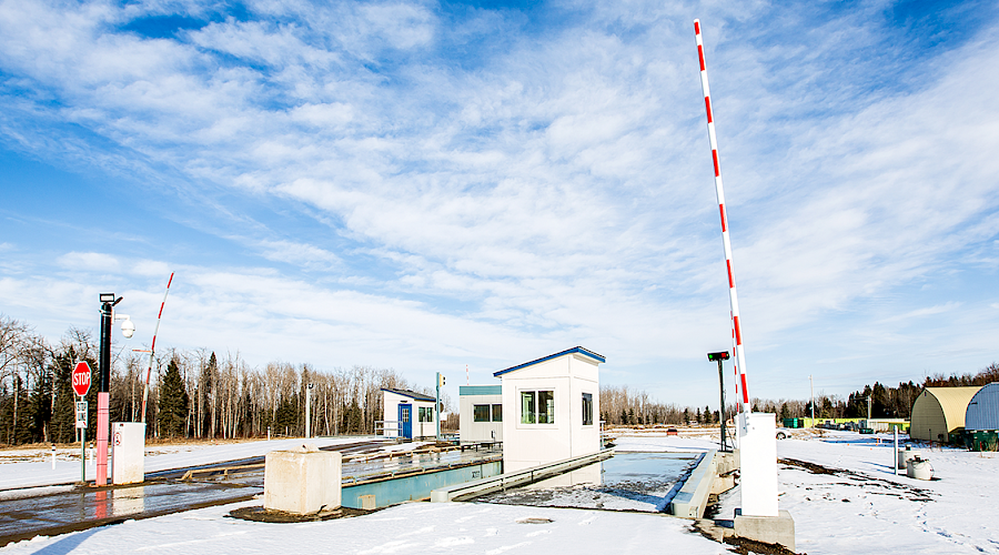 Exterior shot of the Parkland County transfer station with security gate built by Chandos Construction in Alberta