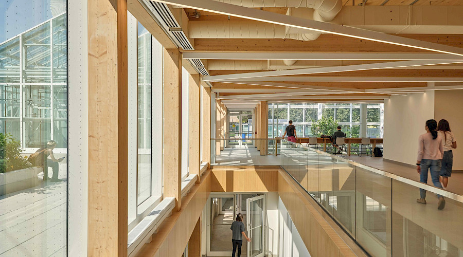 Interior shot of the new McMaster Greenhouse and renovated Life Sciences Building lobby in Hamilton, Ontario, built by Chandos Construction Toronto
