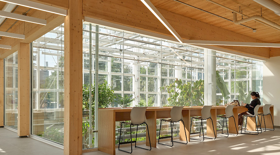 Interior shot of the new McMaster Greenhouse and renovated Life Sciences Building lobby in Hamilton, Ontario, built by Chandos Construction Toronto