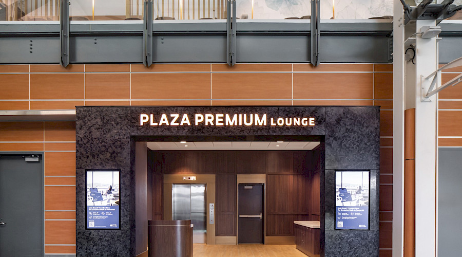 Exterior image of the new Plaza Premium Lounge in YVR built by Chandos Construction Vancouver. Image highlights that the project was in an occupied space within the airport.